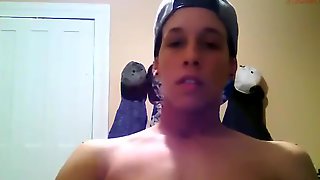 Mixed race cutie jerks his dick and foot teases