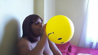 Ebony Smiley Face Balloon Blow