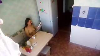 Spying naked mother drinking coffee and reading magazine -MyNakedStepmother