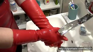 Washing red latex gloves after handjob