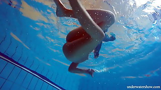 Hot hairy brunette teen in the pool naked