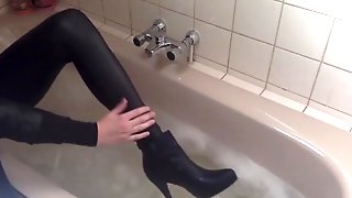 Sexy tight pants ankle boots and heels in bath