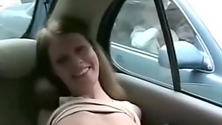 Girl flashes in moving car