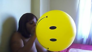 Ebony Smiley Face Balloon Blow
