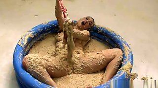 Kymberly Jane - Kym pleasures herself in a pool of oatmeal.