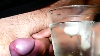 Closeup Thick Cumshot Into a Glass of Cold Water