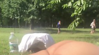 Thong flashing leotard sunbathing in Central Park NYC