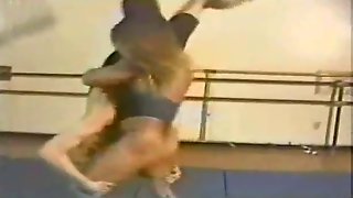 FBB Sharon Marvel wrestling a guy