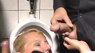 Blonde pissed and fucked in restroom