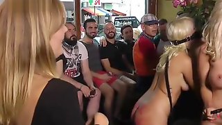 Busty blondes disgraced in crowded bar