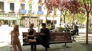 Naked blonde kneeling in public streets