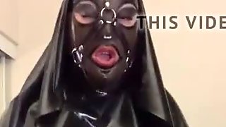 Asian rubber nun latex fetish doll strokes cock