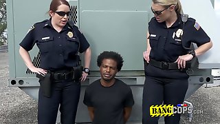 Big breasted officers taste black penis