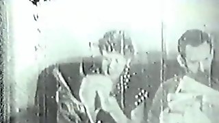 Vintage clip of southern belle with big tits sucking husband's big cock on sofa