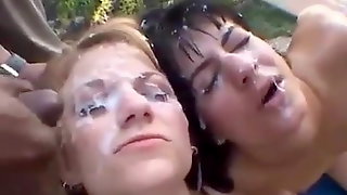 Two girls drenched in hot cum