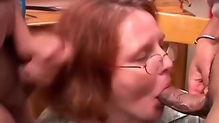 Cute chubby redhead sucks two cocks at the same time