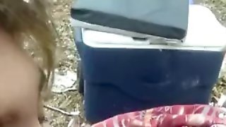 Ugly nerdy whore sucking cock in woods