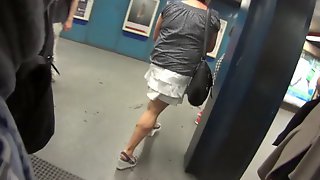 Massive muscular calves on woman in street