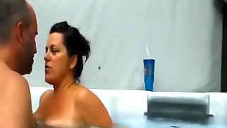 Mature couple having an amazing sex experience in their pool