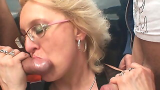 Working mature woman swallows two cocks for money