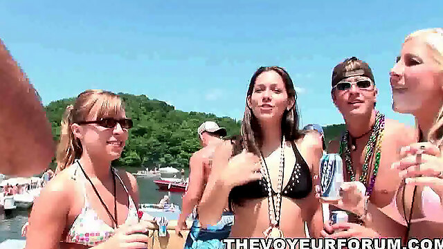 Gang of party gals swallowing and dancing on a boat