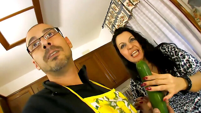 Spanish milf in the kitchen gets DPed by a stiffy and a cucumber
