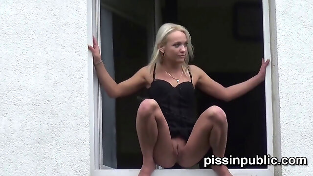 Desperate gals are pissing in front of their neighbours building