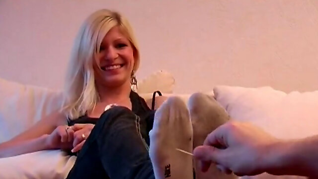 Nina gets her soles tickled in socks