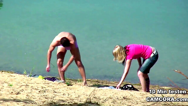Youthfull German Teen Couple hidden cam in orgy on the hamburg beach