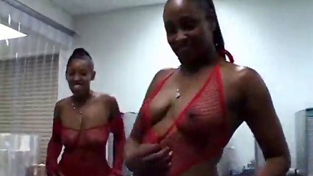 Young ebony duo take turns inhaling milky man in a store room