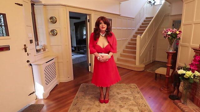 Sindy in red cocktail dress and jacket inside