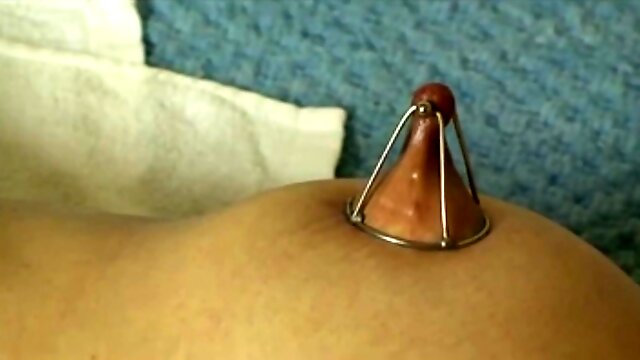 Nipple clamps and glowing wax - BDSM video