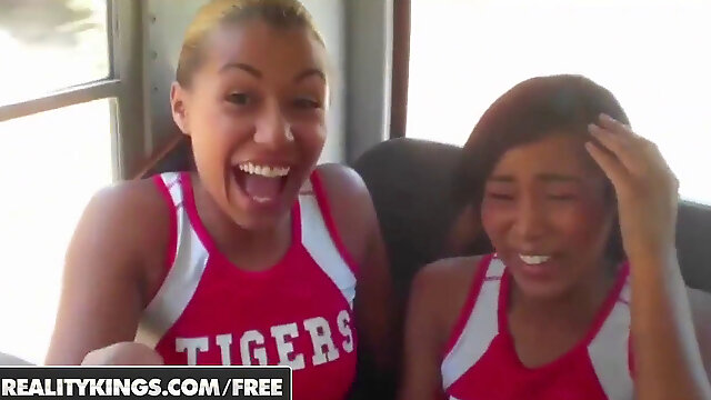 Ebony Cheerleaders in uniform gargle and lick on the bus - REALITYKINGS