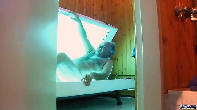 Attractive teen babe and a horny elderly man are having a great time, while in the sauna