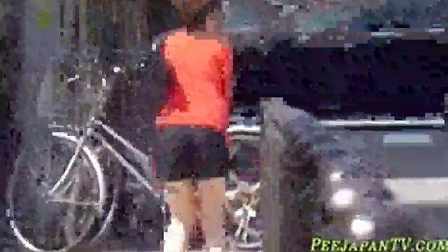 Bizarre Asian whore pees in car park