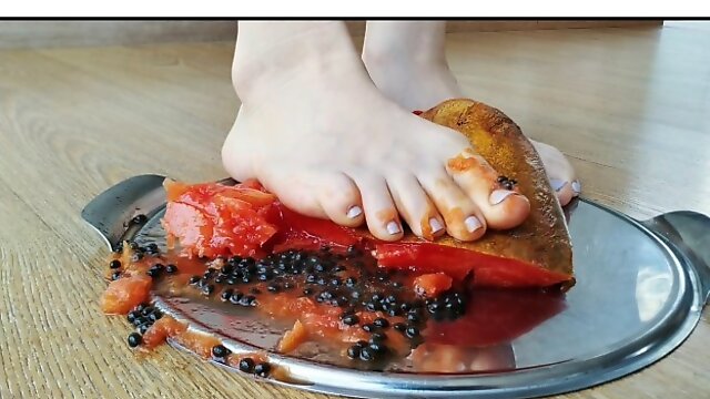 Crushing a papaya with my bare naked feet