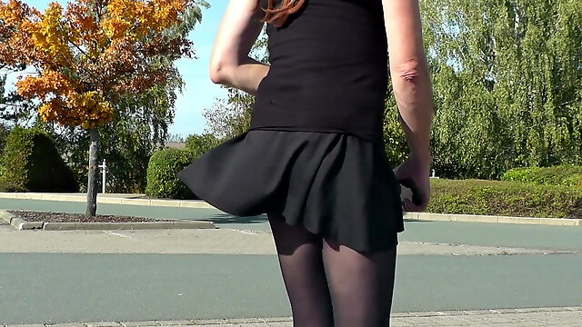 Crossdresser Sissy on windy day outside in short skirt