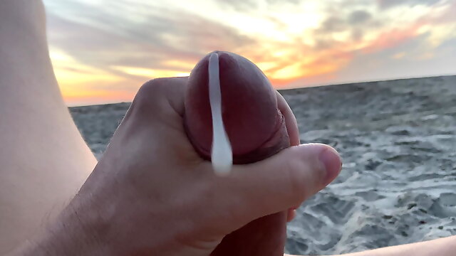 Outdoors masturbation jacking off public beach at sunset 