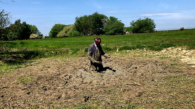 Business suit in mud. Part 2