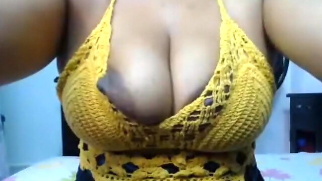 Mature huge tits with big brown nipples areolas, close-up