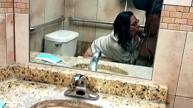Public bathroom blowjob
