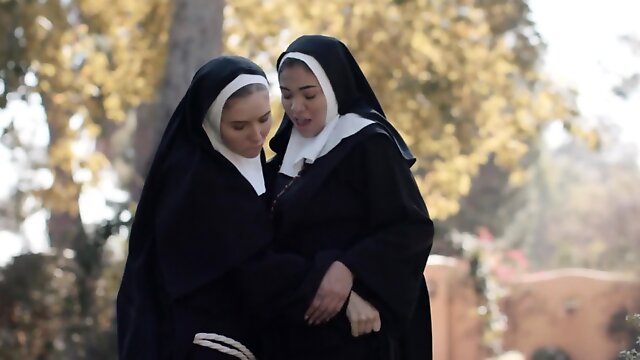 Lesbian nuns get freaky with each other outdoors