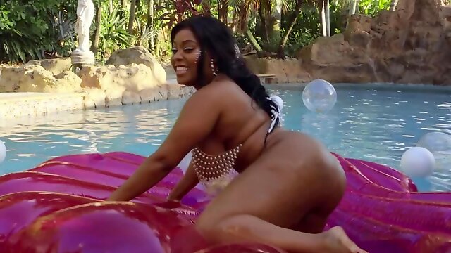 Ebony possessor of massive boobs and butt fucked by the pool