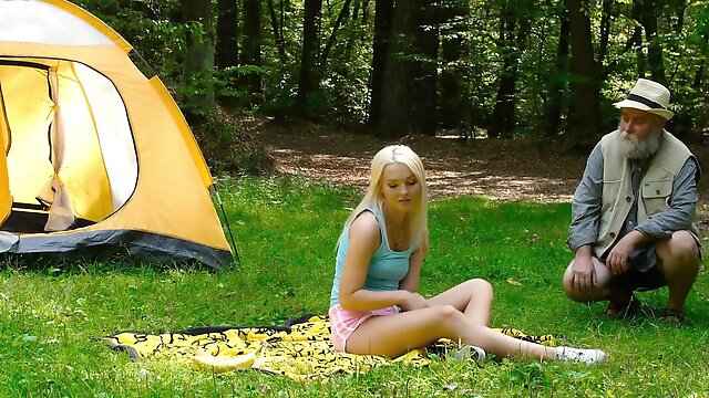 Blonde satisfied by old stranger during picnic in forest