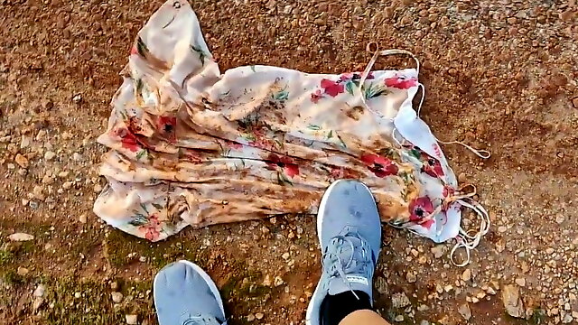 Floral 10 dress in mud puddle and then clean shoes on it