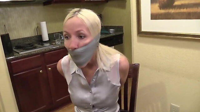Duct Tape Wrap Gagged and Tied in Chair
