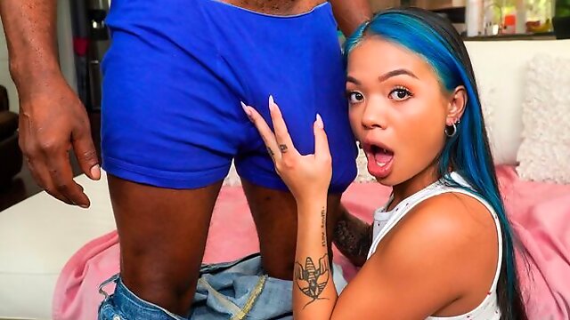 Blue-haired teen Paisley Page jumps on a very long black cock