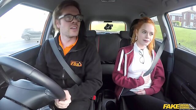 Ginger babe gives driving instructor a bright orgasm