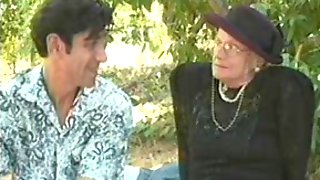 GRANNY AWARD 5 blonde  mature with a young man outdoor