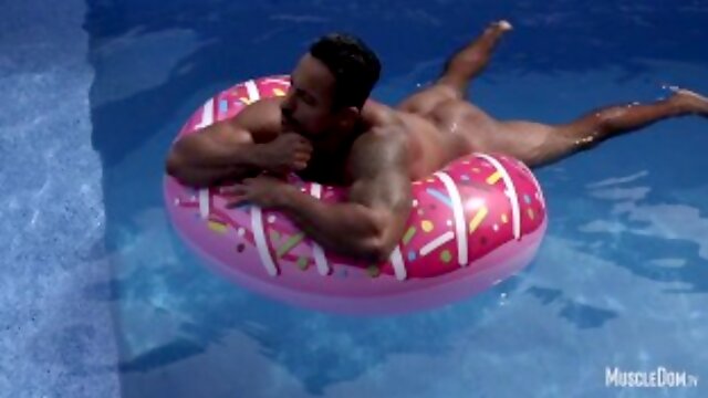 Hot muscle man in pool